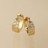 Golden scallop embossed hoop earrings